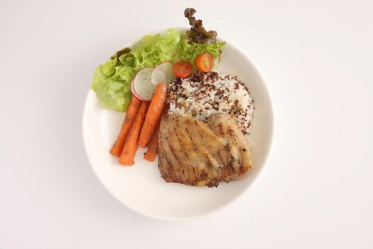 Grilled chicken with rice isolated in white background