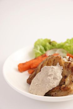 Grilled chicken with rice isolated in white background