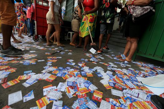 salvador, bahia, brazil - october 2, 2022: distribution of publicity pamphlets of candidates a voting section during general elections in the city of Salvador
