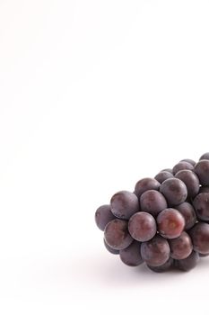 Red grapes isolated in white background