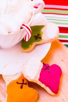 Colorful Christmas sugar cookies with hot chocolate.