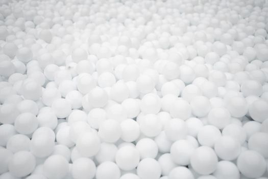 Many white plastic balls for dry pool in amusement park