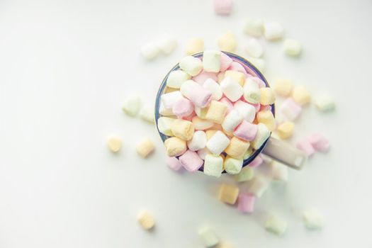 Hot chocolate and marshmallow on christmas background. Selective focus. food