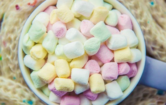 Hot chocolate and marshmallow on christmas background. Selective focus. food