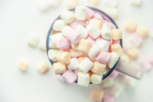 Hot chocolate and marshmallow on christmas background. Selective focus. food