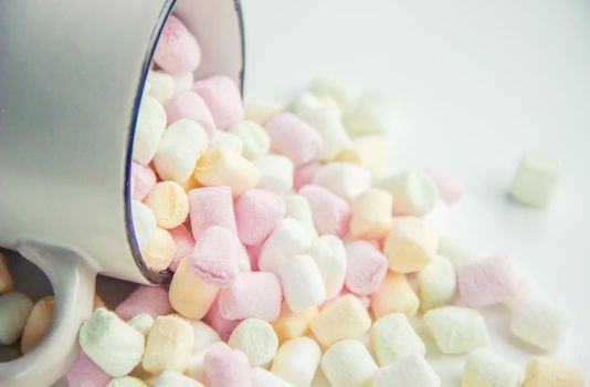 Hot chocolate and marshmallow on christmas background. Selective focus. food