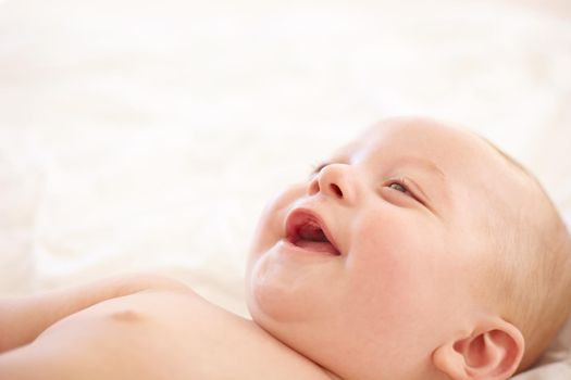 Sweet child of mine. Cute little baby laughing happily - copyspace