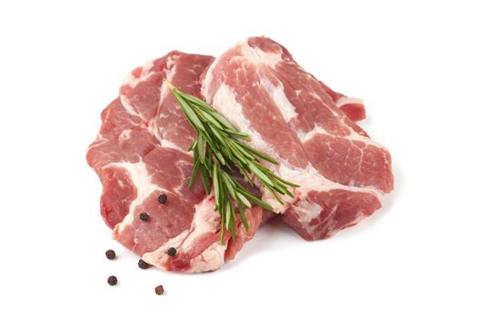 Raw meat with rosemary on a white background