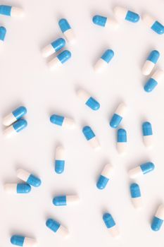 pills capsules close up on top view isolated in white background