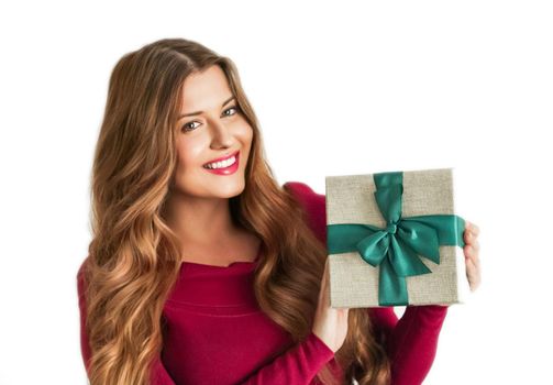 Christmas holiday present, happy woman holding a gift or luxury beauty box subscription delivery isolated on white background, portrait