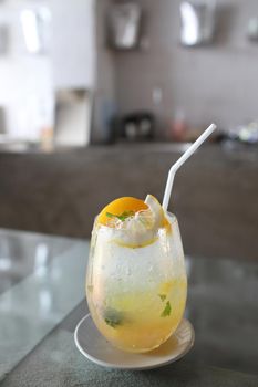 Yellow Cocktail glass with ice