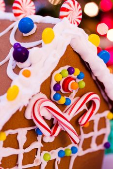 Gingerbread house with small presents.