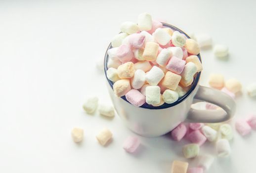 Hot chocolate and marshmallow on christmas background. Selective focus. food