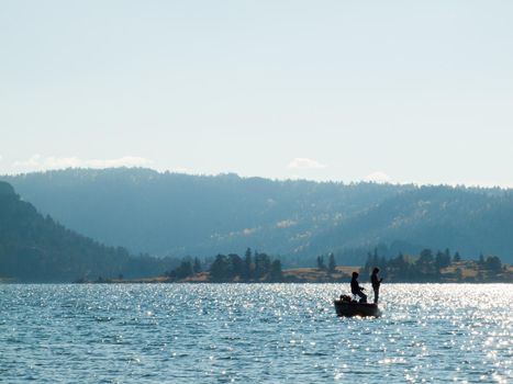 Early morning fishing from the boat in Autumn.