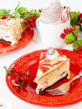 Traditional Christmas White Chocolate Peppermint Cheesecake on white background.