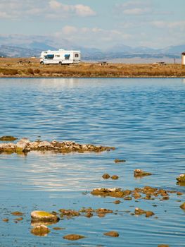 Motorhome campsite near the lake on early morning late in the season.