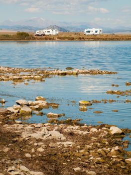 Motorhome campsite near the lake on early morning late in the season.