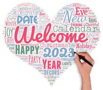 Word cloud in the shape of a heart with new year 2023 words with hand and pen