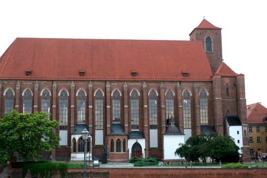 Ancient buildings on Ostrow Tumski at daytime in Wroclaw. High quality photo