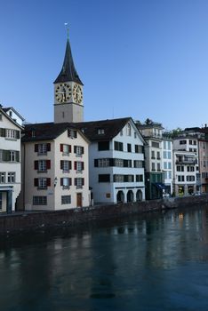 old building in zurich by a river