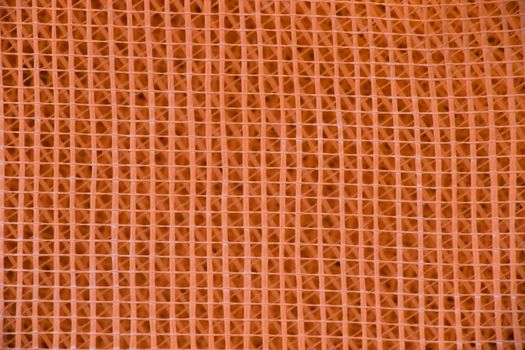 orange plastic fence for XPS, background and texture