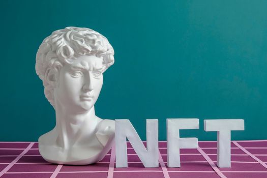 David and NFT token in vaporwave style with copy space as a minimal concept of online technology and art with cryptocurrency in the digital world. High quality photo