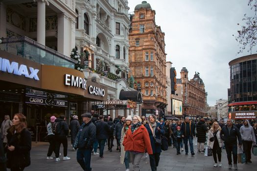 London, December 3rd 2022 - People passing by at Leicester Square Christmas Market