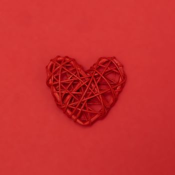 Valentines day red heart on same color background. Monochromatic vivid color. Valentine's day concept. Close up, copy space