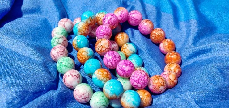 Three Colorful Beads Bracelet, Rainbow Bohemian Handmade Jewelry, Close Up. High quality photo