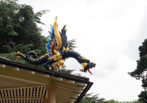 Detail of a restored mythical dragon figurine on the pagoda in Kew botanical Gardens in London
