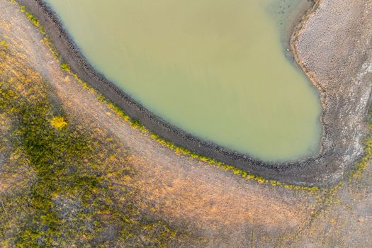 Drone top view of swamp. Swampy landscape. View of an marsh from height. Aerial photography
