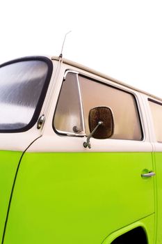 A bright light green and white retro van detail