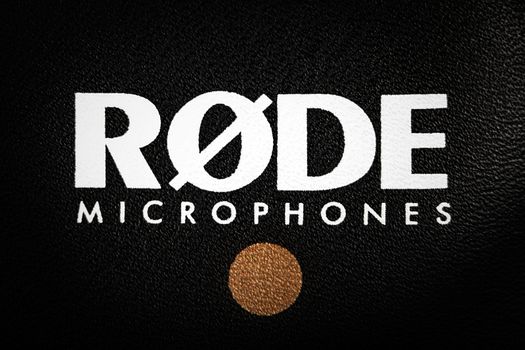 RODE microphones - brand logo on black leather surface. Almaty, Kazakhstan - January 13, 2022