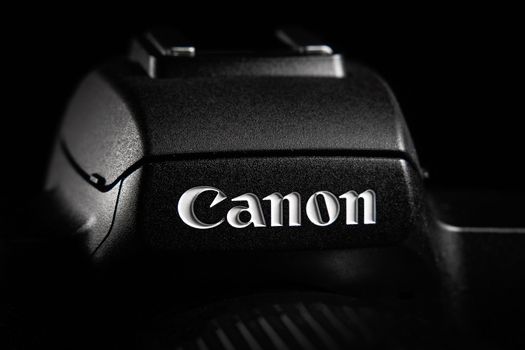 CANON label editorial photo. Close-up logo trademark of canon camera. Almaty, Kazakhstan - January 13, 2022