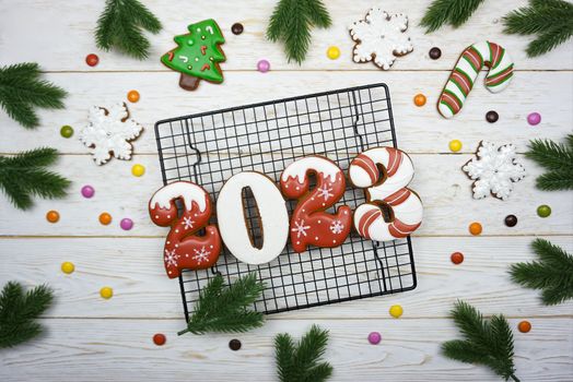 New Year's gingerbread numbers 2023 are on the grid. Symbol of the year 2023. The year of the rabbit. Chinese New Year.d in the form of numbers 2023 .