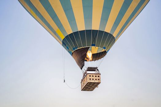 Beautiful hot air balloons over blue sky.