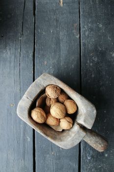 Walnuts in a retro wooden box. Natural food.