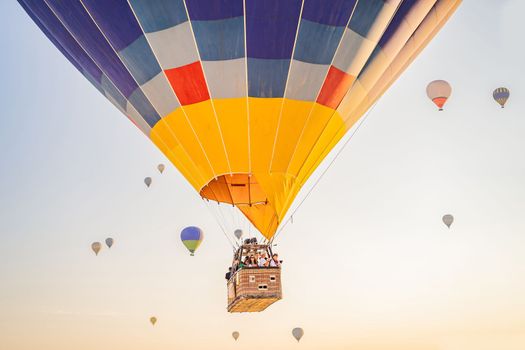 Beautiful hot air balloons over blue sky.