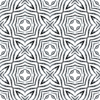 Watercolor ikat repeating tile border. Black and white uncommon boho chic summer design. Ikat repeating swimwear design. Textile ready adorable print, swimwear fabric, wallpaper, wrapping.