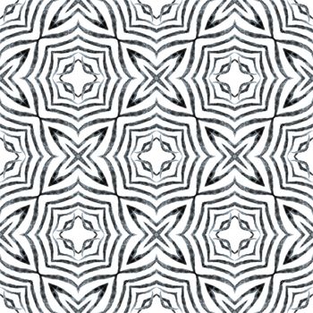 Watercolor ikat repeating tile border. Black and white uncommon boho chic summer design. Ikat repeating swimwear design. Textile ready adorable print, swimwear fabric, wallpaper, wrapping.