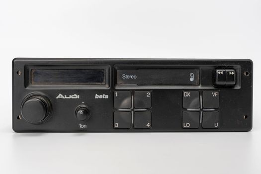 old vintage car radio on a white background. High quality photo