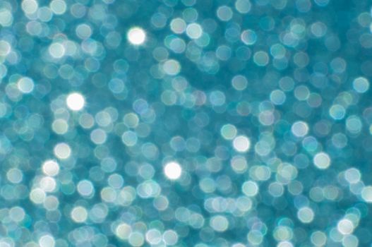 sparkling blue bokeh from drops, abstraction, festive background, High quality photo