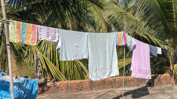 Washed linen to dry on the roof under the sun in the open air. High quality photo