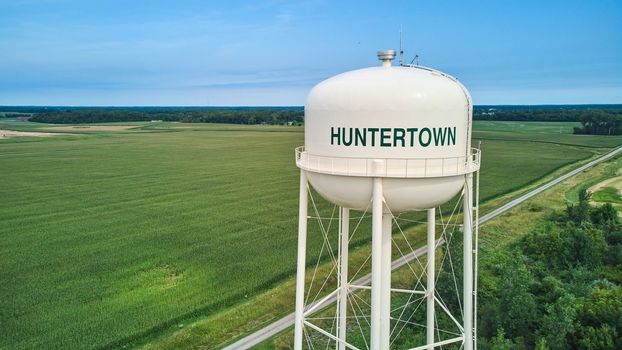 Image of Aerial of Huntertown, Indiana water tower with farming fields surrounding