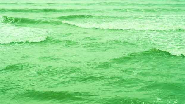 Real photo sea water waves, abstract background, nature power, bright green more tone in stock.