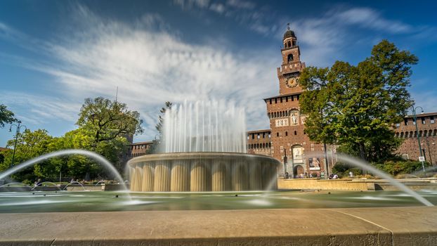 Castello Sforzesco square with fountain in Milan, Italy. Long Exposure.