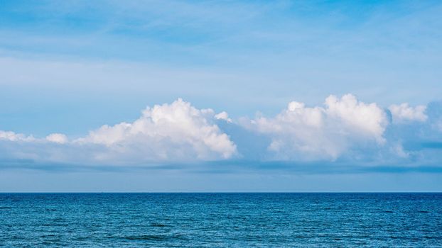 Atmosphere panorama real photo beautiful summer white cloud clear blue sky horizon line calm empty sea. Concept paradise life. Design relax wallpaper background. More tone format collection in stock.