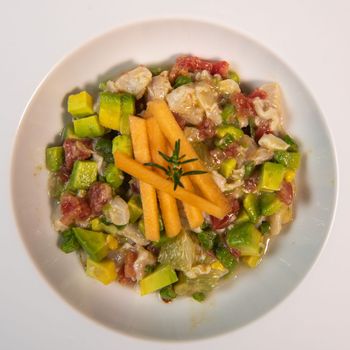 Recipe for ceviche of sea bream with avocado, chilli and lime. High quality photo
