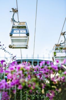 Funicular cabins on background of sky and nature, close-up