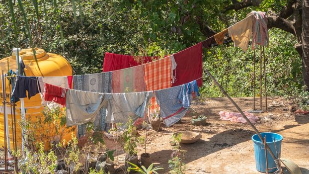 Drying clothes on the street on a rope after washing. High quality photo